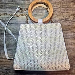 LD crossbody handbag with O handles, used